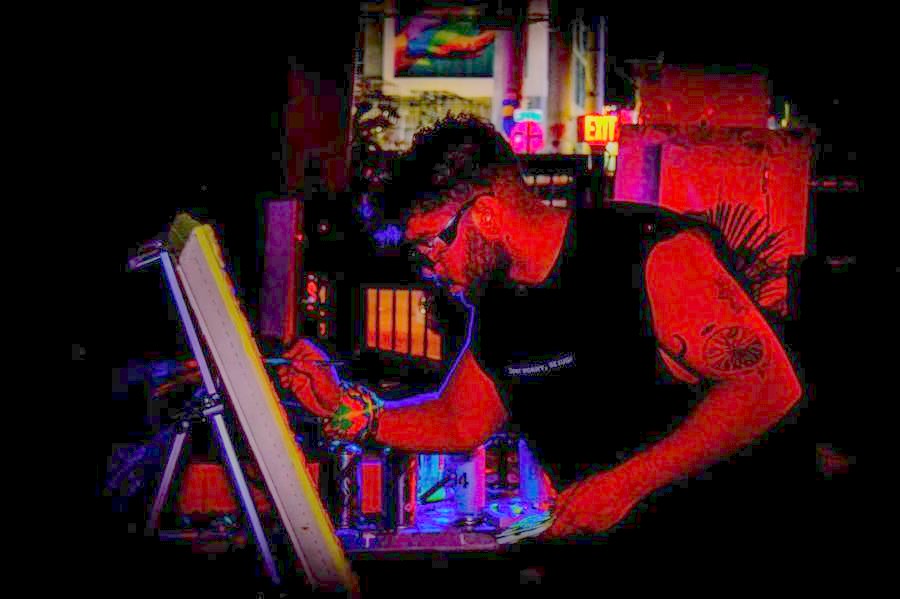 Cundo Marchi painting live under blacklight, Art Basel Week, Miami